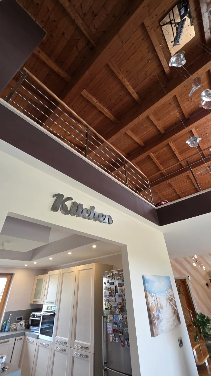 The mezzanine and exposed timber roof